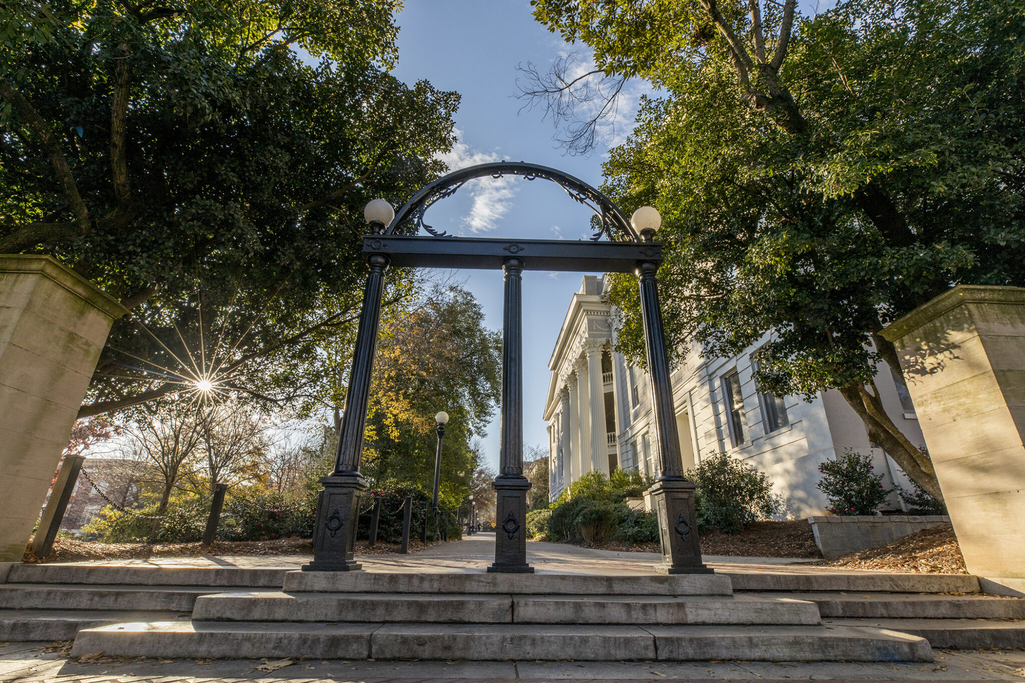 The UGA arch is pictured at sunset
